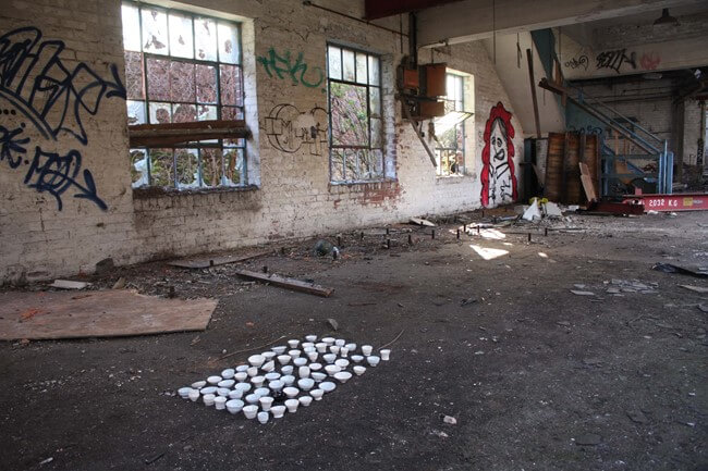 Installation at Steel Mill, Sheffield, February 2009. Thrown porcelain vessels as part of an installation, recorded by photography.